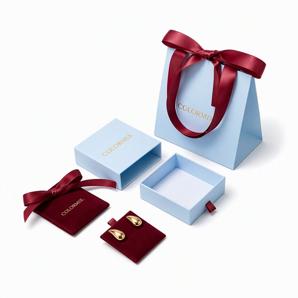 Printed rigid flip-lid box in a rose and butterfly repeat pattern with gold foil lettering